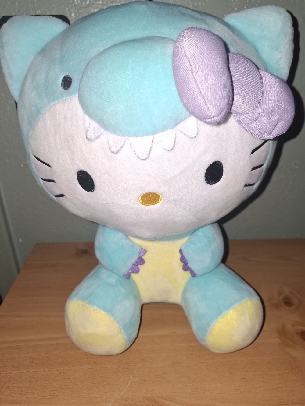 Hello Kitty Plush in Aqua Dino Costume with Lavender Bow